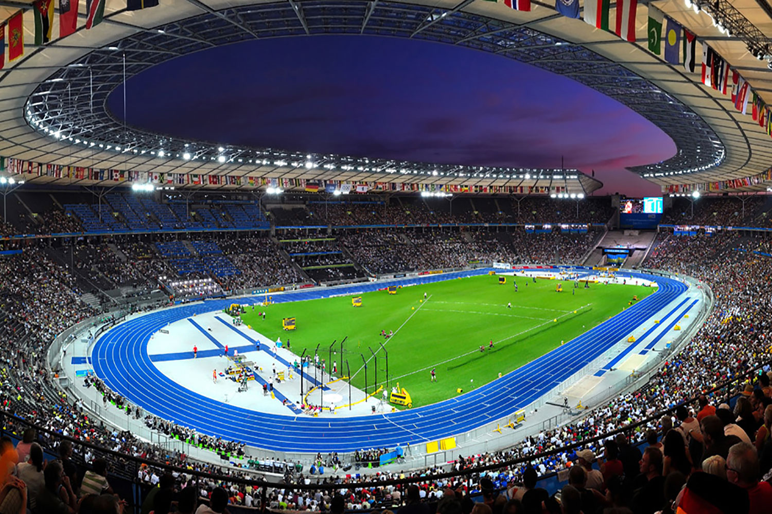 Supporters walking towards a Berlin football stadium