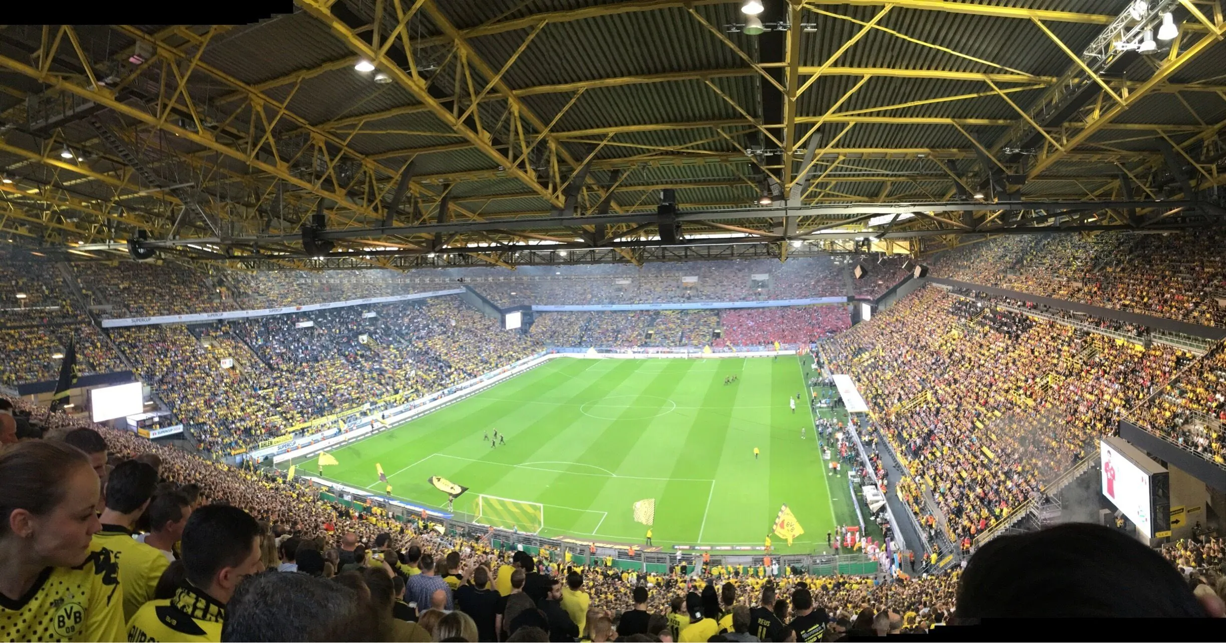 Supporters walking towards Signal Iduna Park in Dortmund
